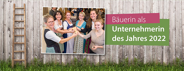 Das Bayerische Staatsministerium für Ernährung, Landwirtschaft und Forsten sucht 2022 die "Bäuerinnen als Unternehmerinnen des Jahres". Sechs Frauen in Dirndl reichen sich die Hände und lächeln in die Kamera.
