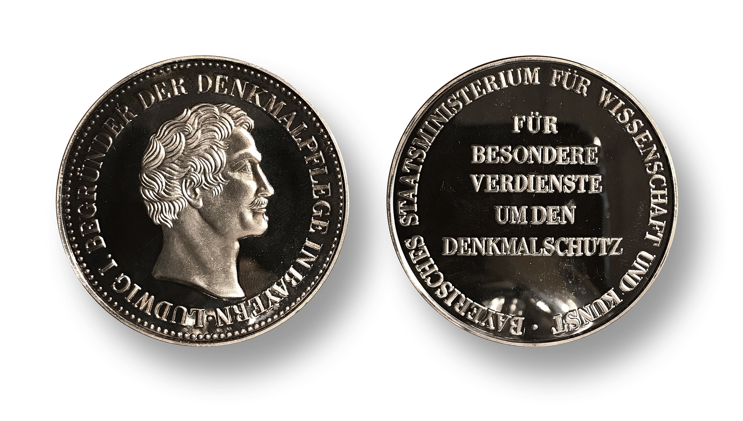 Bayerische Denkmalschutzmedaille Die silberfarbene Bayerische Denkmalschutzmedaille